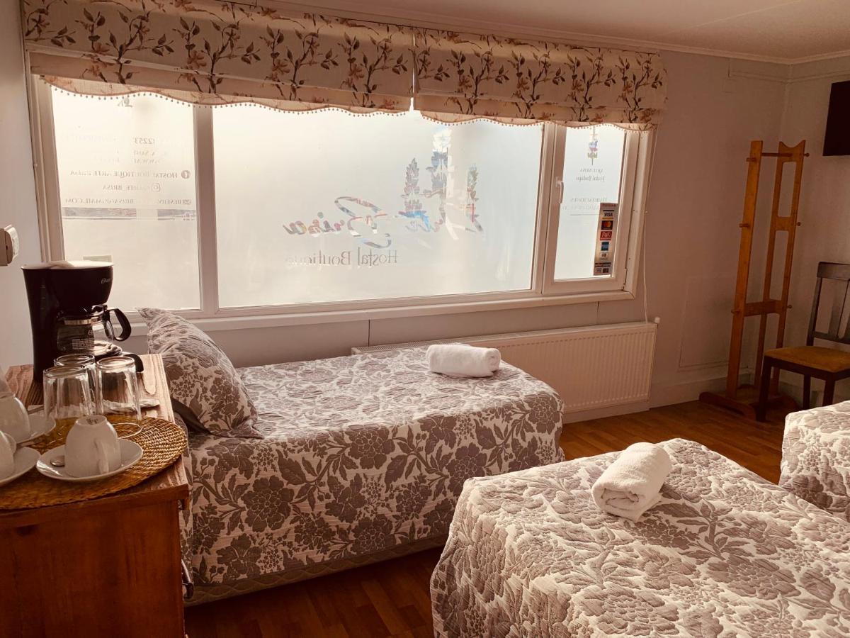 Arte Brisa Hostal Boutique プエルト・ナタレス エクステリア 写真
