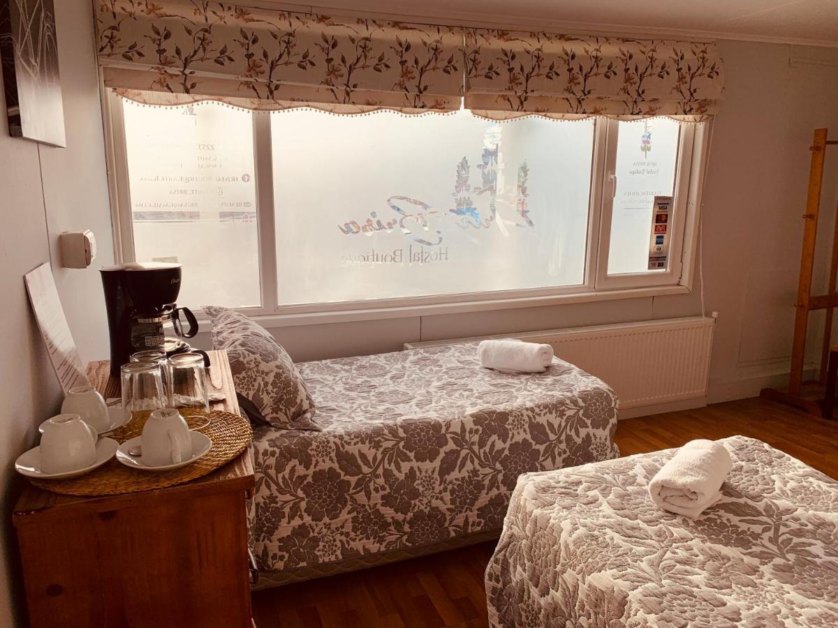 Arte Brisa Hostal Boutique プエルト・ナタレス エクステリア 写真
